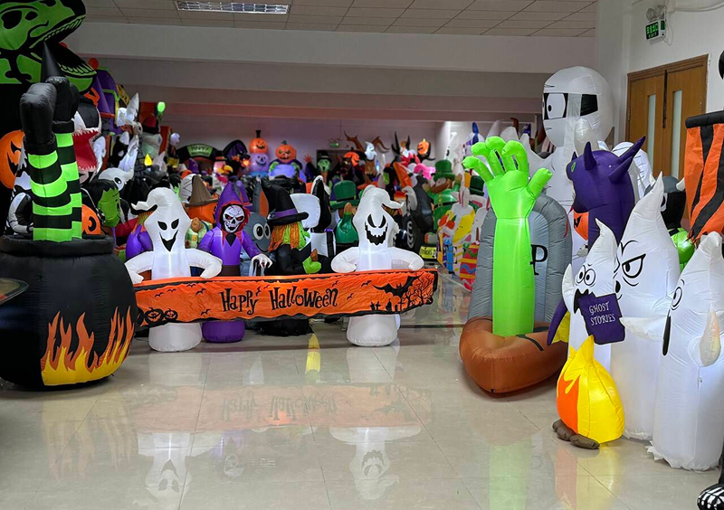 Inflatable Halloween decorations in a room display.
